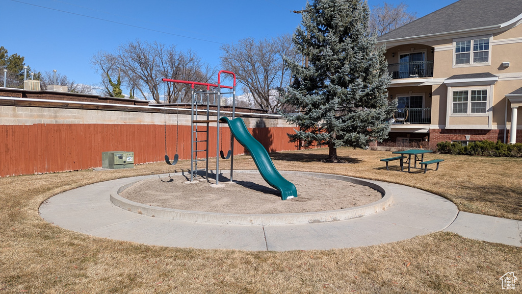 Communal playground featuring a yard