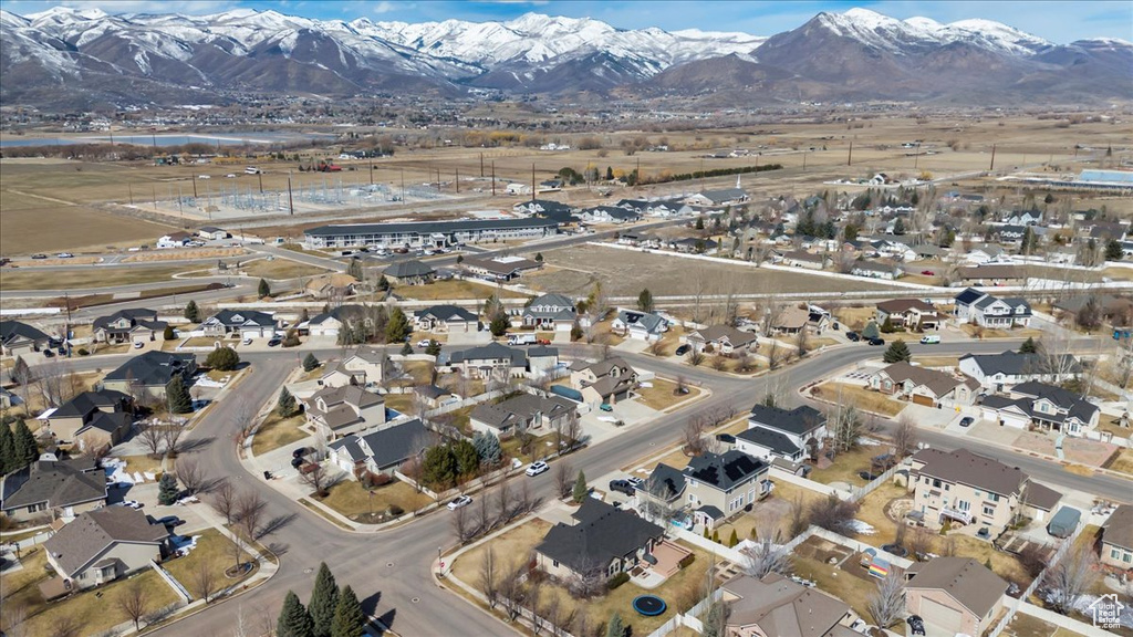 Drone / aerial view featuring a residential view and a mountain view