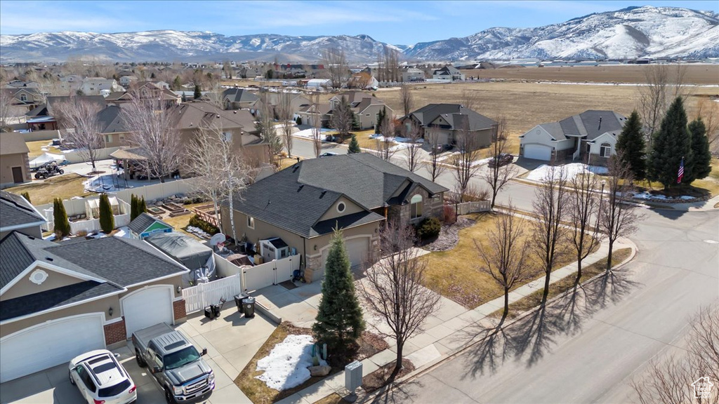 Birds eye view of property featuring a residential view and a mountain view