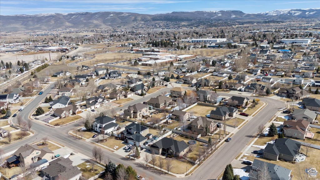 Drone / aerial view featuring a residential view and a mountain view