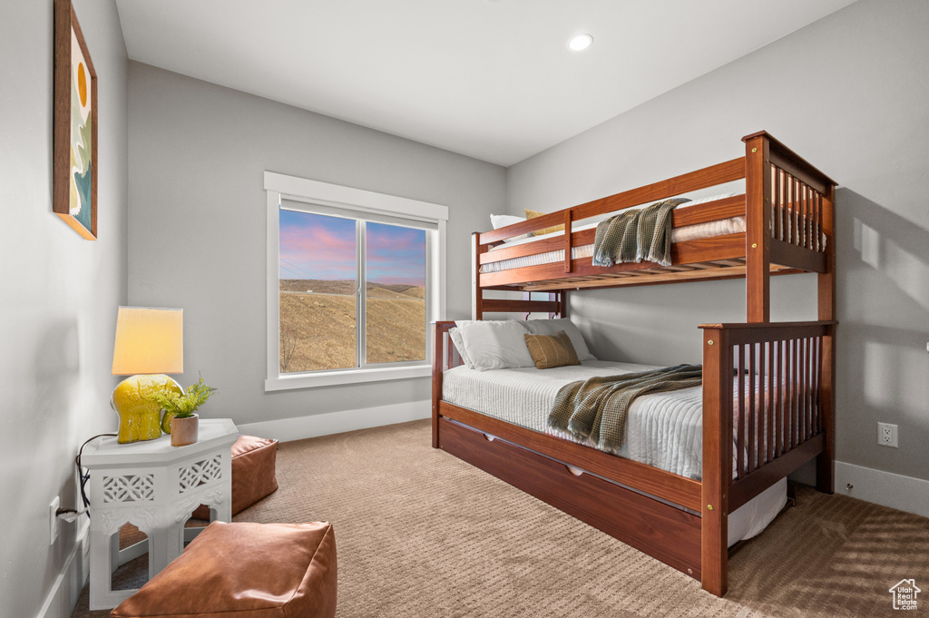 Bedroom with carpet flooring, recessed lighting, and baseboards