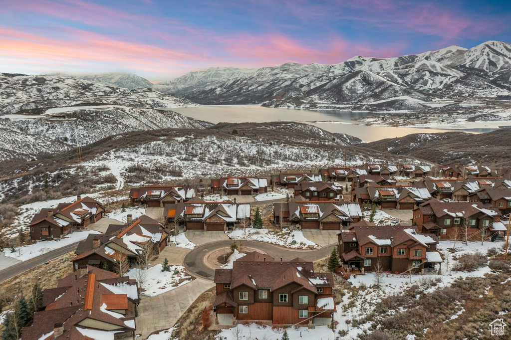 Property view of mountains with a residential view