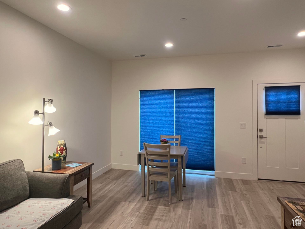 Dining space featuring recessed lighting, visible vents, and light wood finished floors