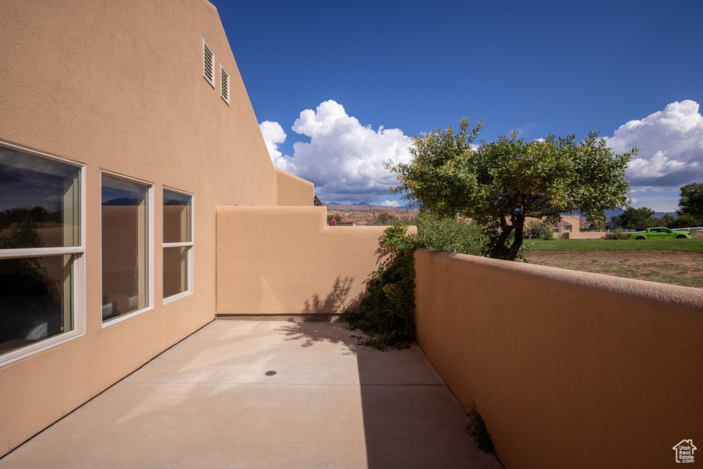 View of patio / terrace featuring fence