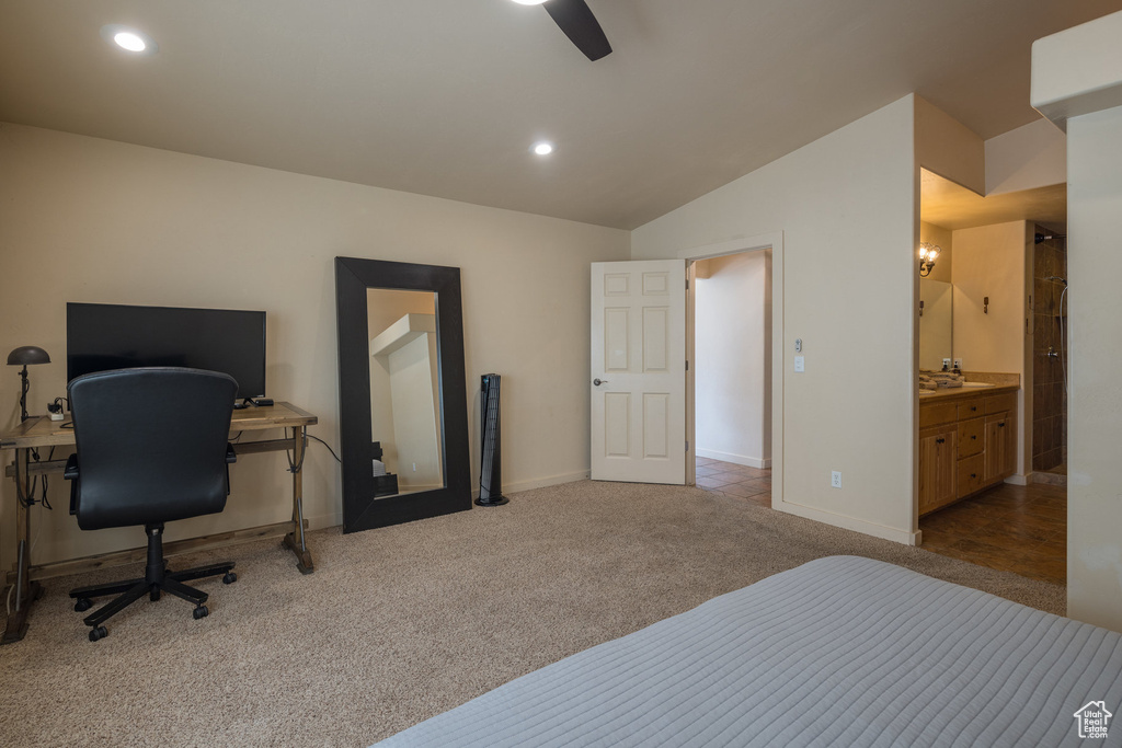 Bedroom with vaulted ceiling, recessed lighting, baseboards, and carpet floors