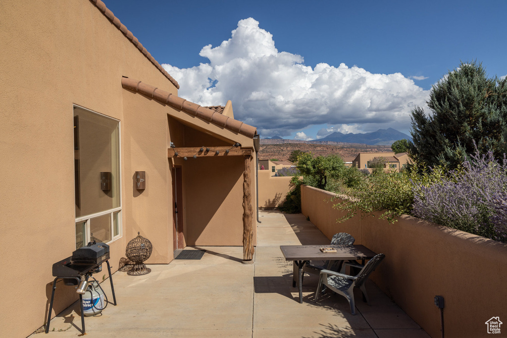 View of patio featuring a mountain view