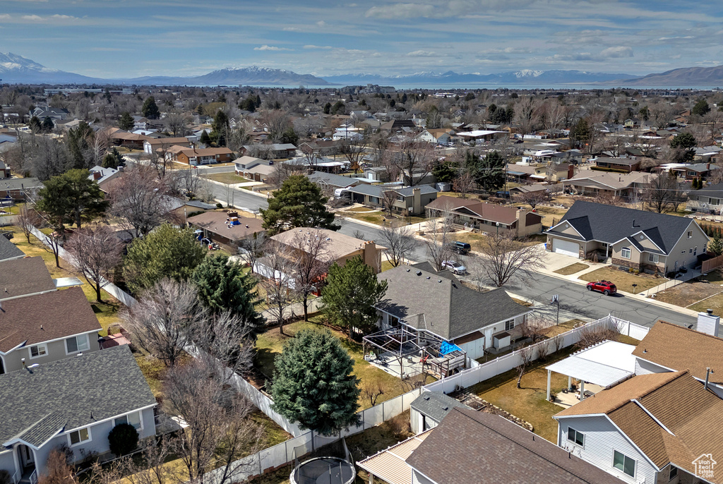 Drone / aerial view featuring a mountain view and a residential view