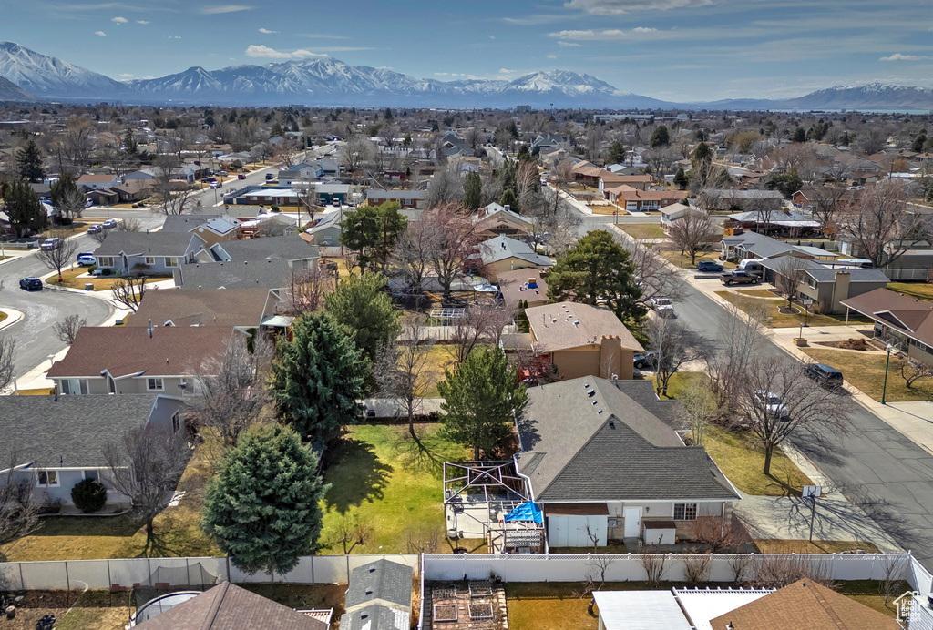 Drone / aerial view with a mountain view and a residential view