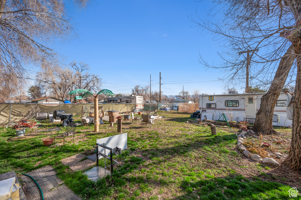 View of yard with fence