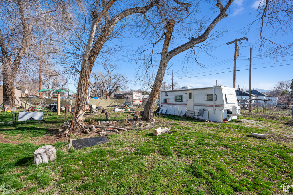 View of yard with fence