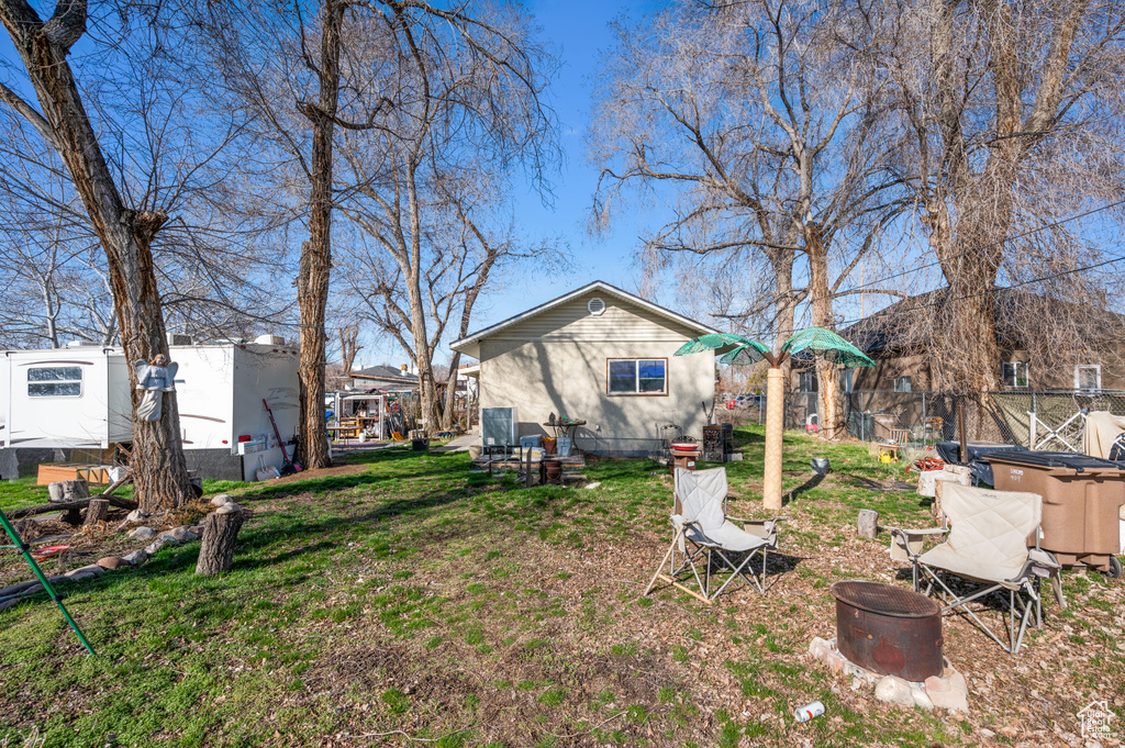 View of yard featuring fence