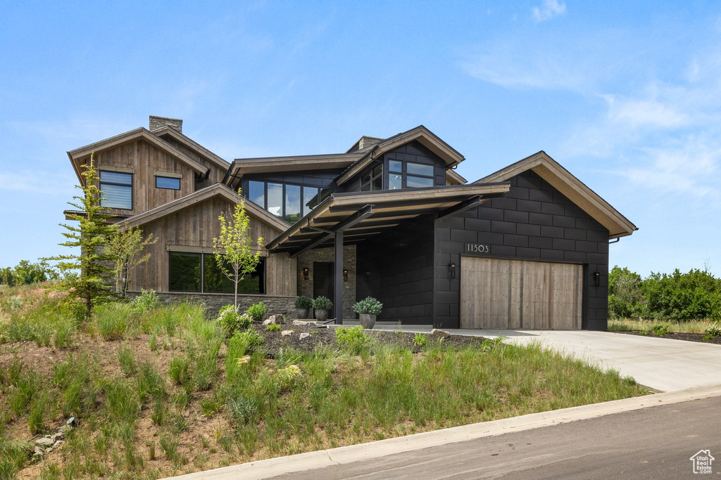 View of front of home with concrete driveway