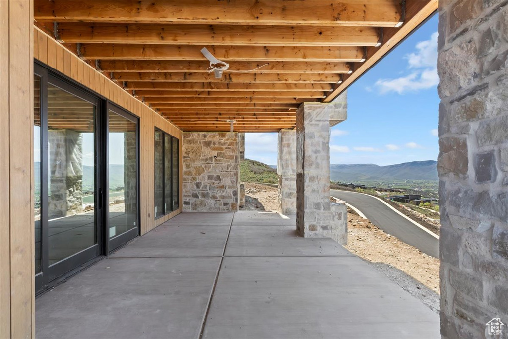 View of patio featuring a mountain view