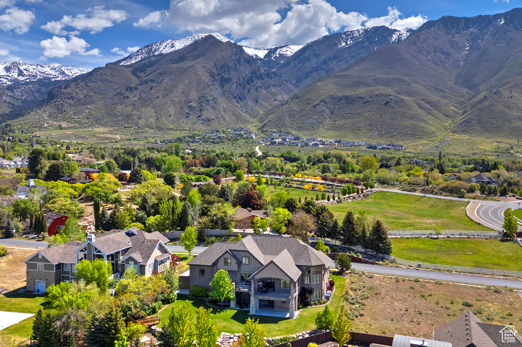 Aerial view of residential area featuring mountains