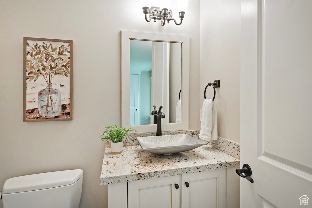 Bathroom featuring toilet and vanity