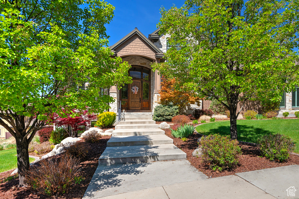 Property entrance with stone siding