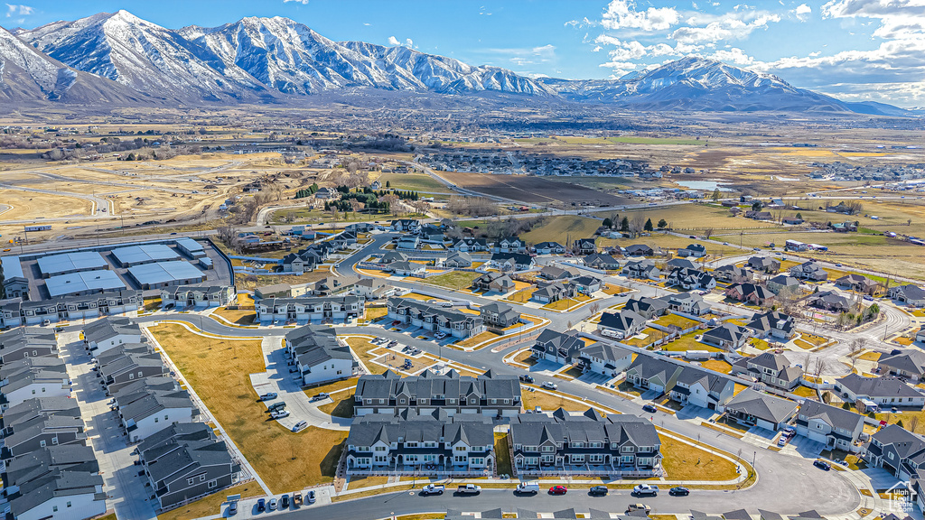 Drone / aerial view with a residential view and a mountain view