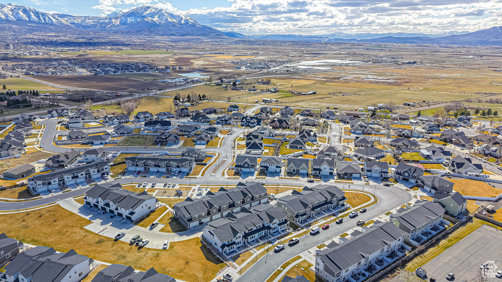 Birds eye view of property featuring a mountain view and a residential view