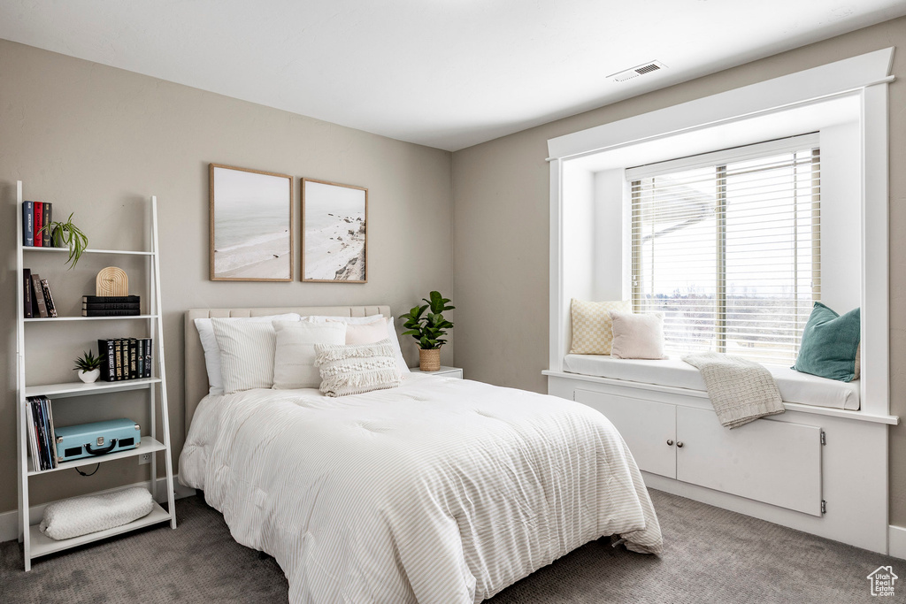 Bedroom featuring carpet floors