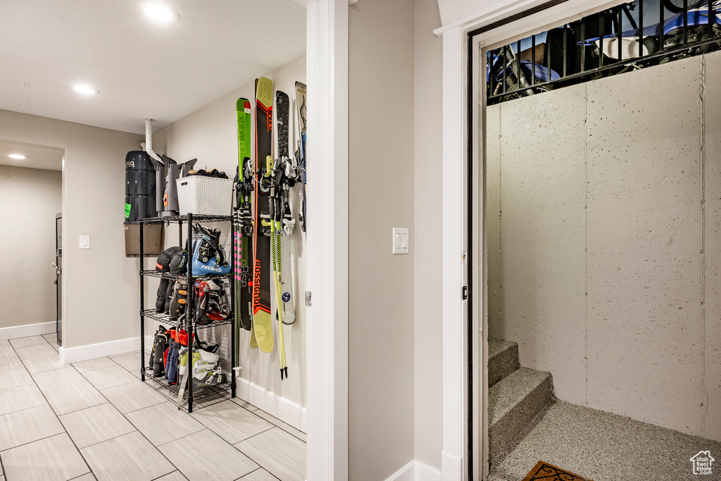 Below grade area with recessed lighting and baseboards
