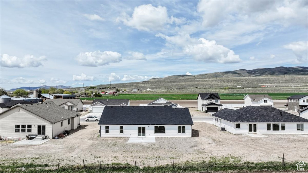 Drone / aerial view featuring a residential view and a mountain view