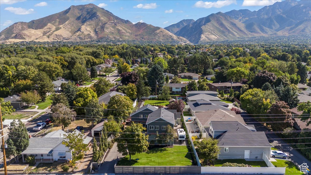 Drone / aerial view featuring a mountain view and a residential view