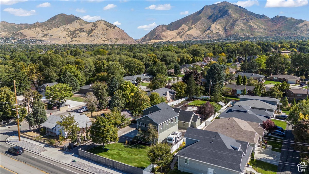 Aerial view featuring a forest view, a mountain view, and a residential view