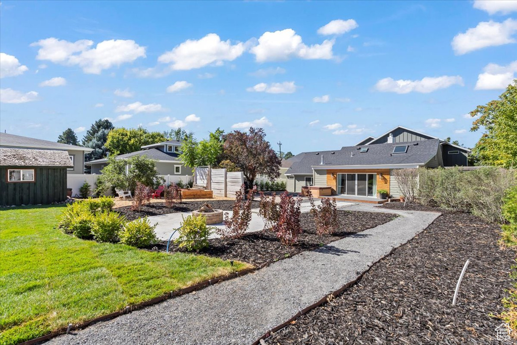 View of yard featuring a patio and fence