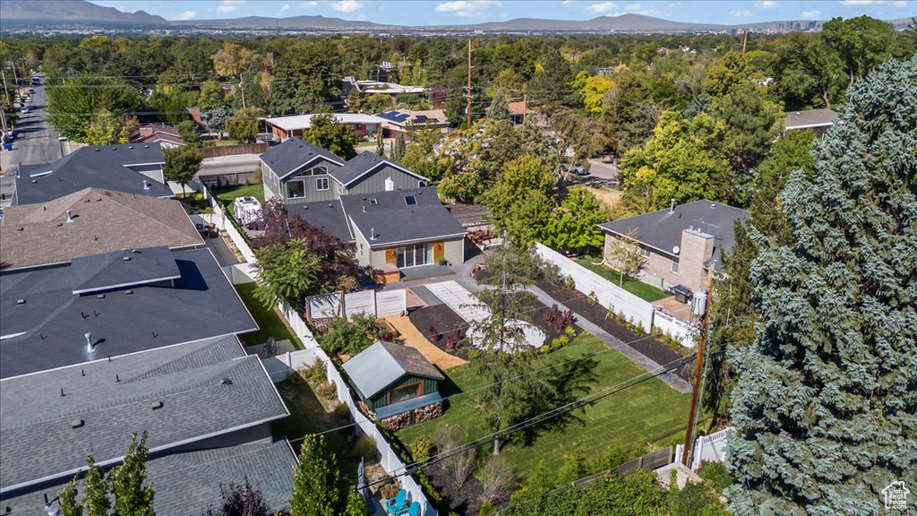 Aerial view featuring a forest view, a mountain view, and a residential view
