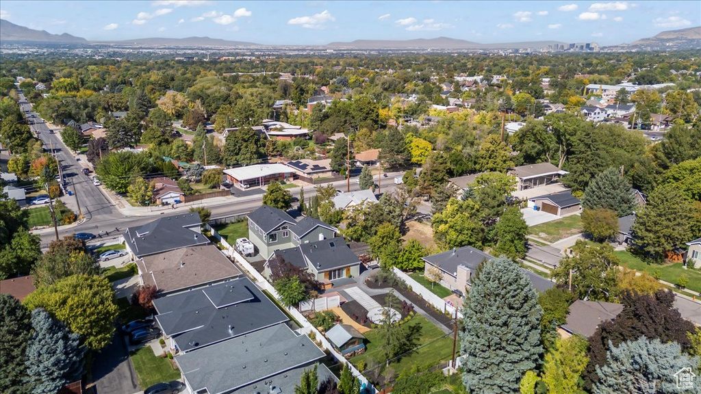 Drone / aerial view with a residential view and a mountain view