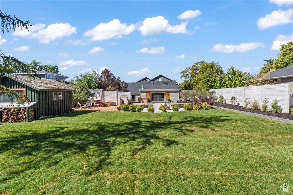 View of yard with a fenced backyard