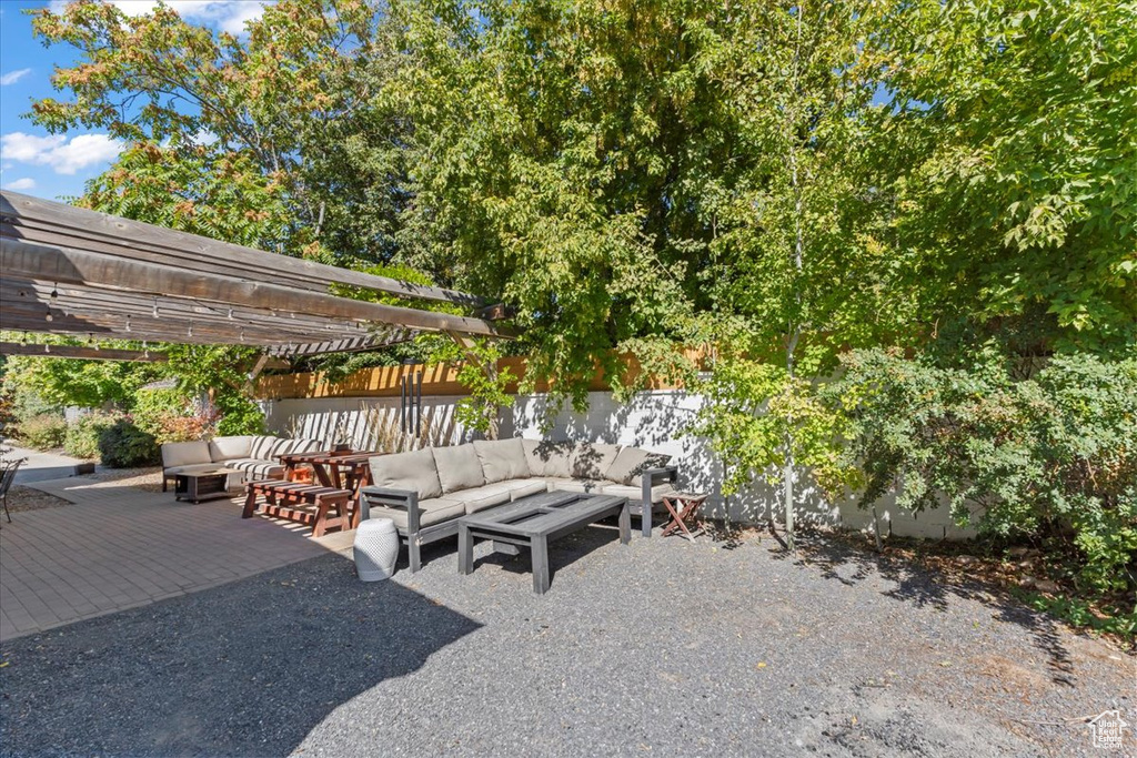 View of patio / terrace featuring a pergola and an outdoor hangout area
