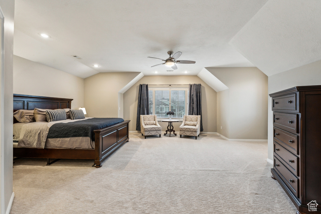 Bedroom featuring ceiling fan, baseboards, vaulted ceiling, light carpet, and recessed lighting