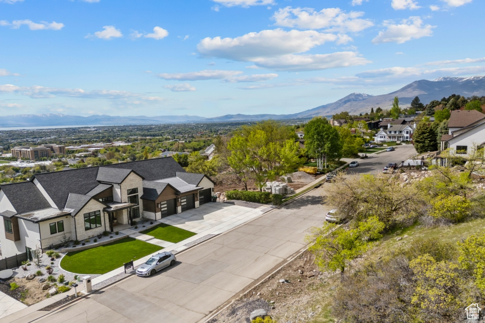 Drone / aerial view with a mountain view and a residential view