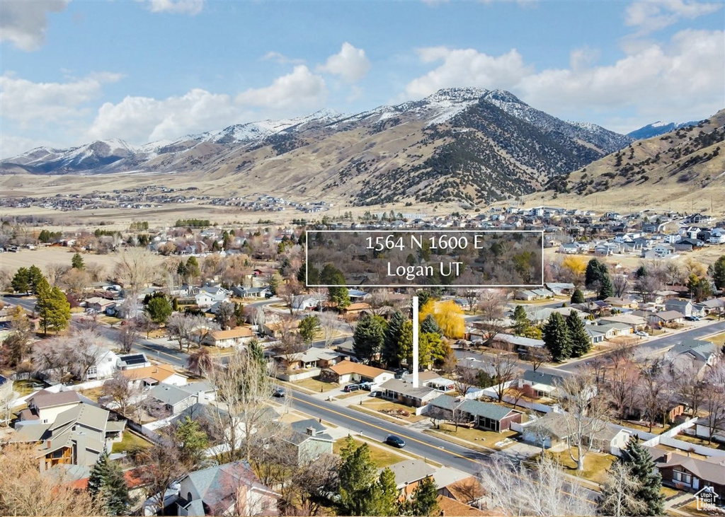 Property view of mountains featuring a residential view
