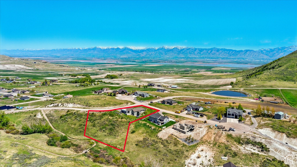 View of property location with property boundaries highlighted and a water and mountain view