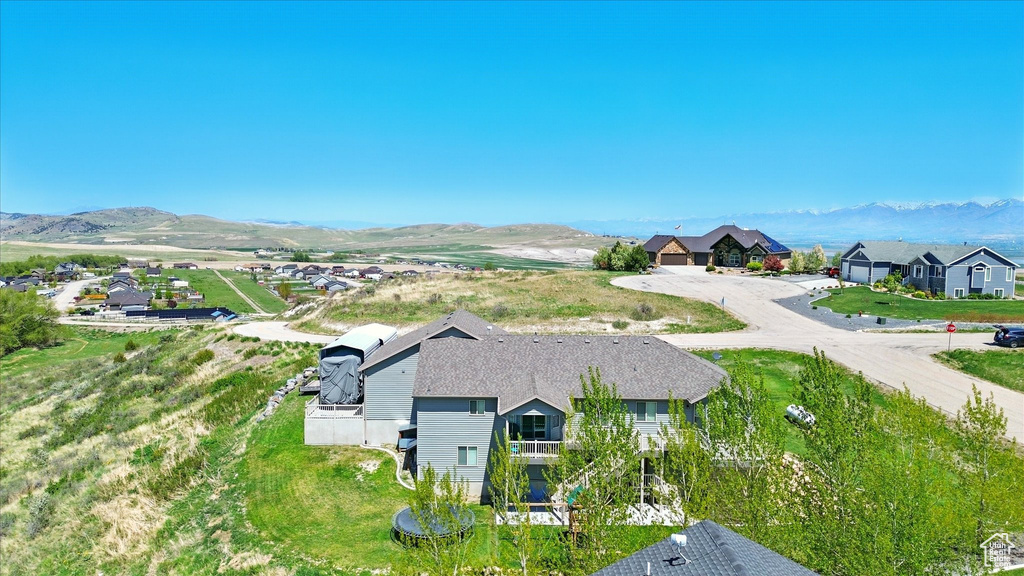 Aerial view of residential area with a mountainous background