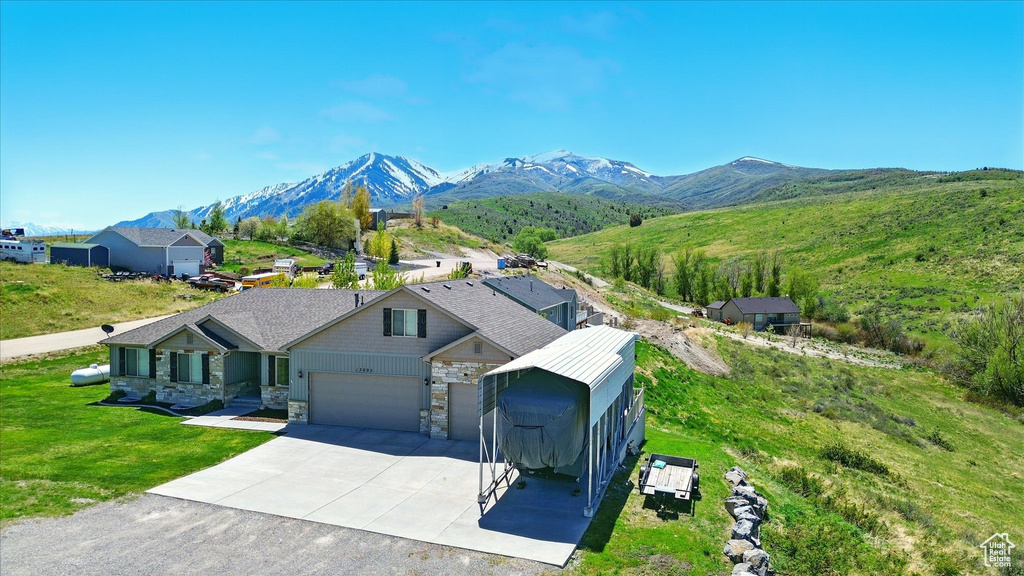 View from above of property with a mountainous background