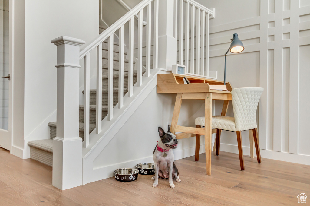 Staircase with wood finished floors