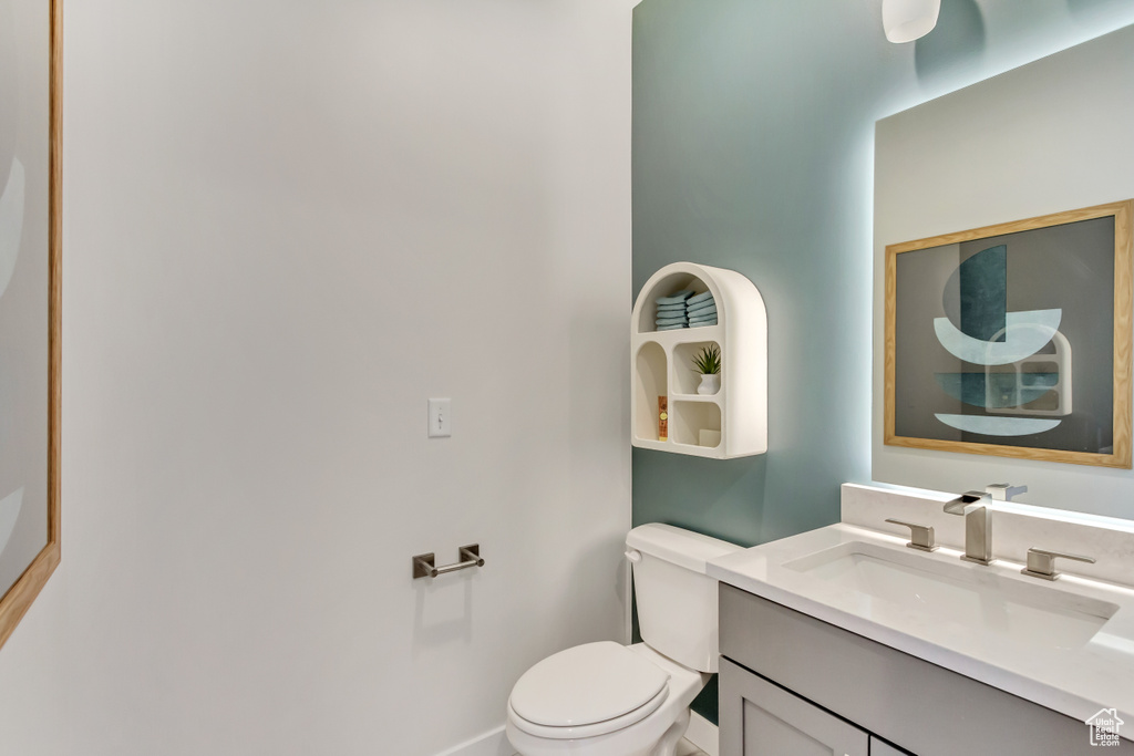 Bathroom featuring toilet and vanity