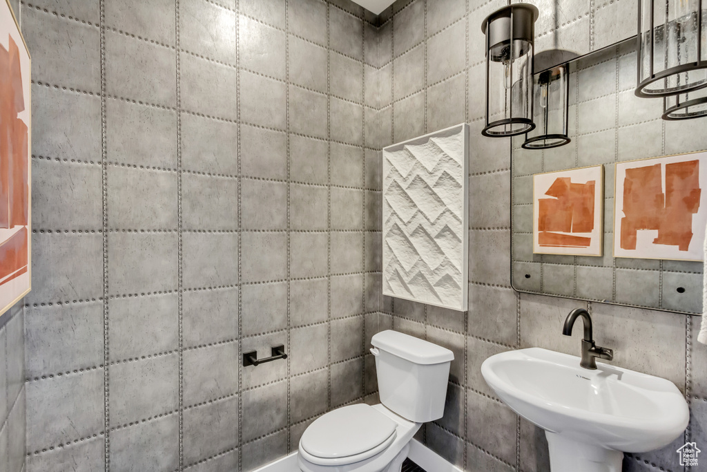 Bathroom with a sink and toilet