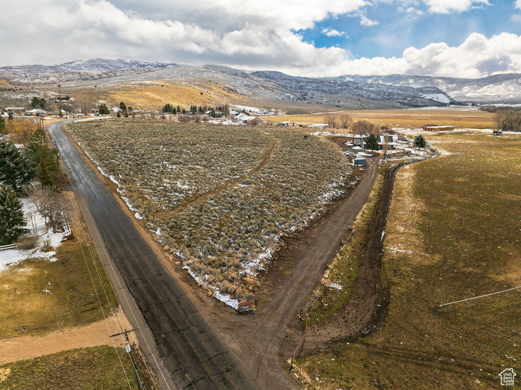 Drone / aerial view with a rural view and a mountain view