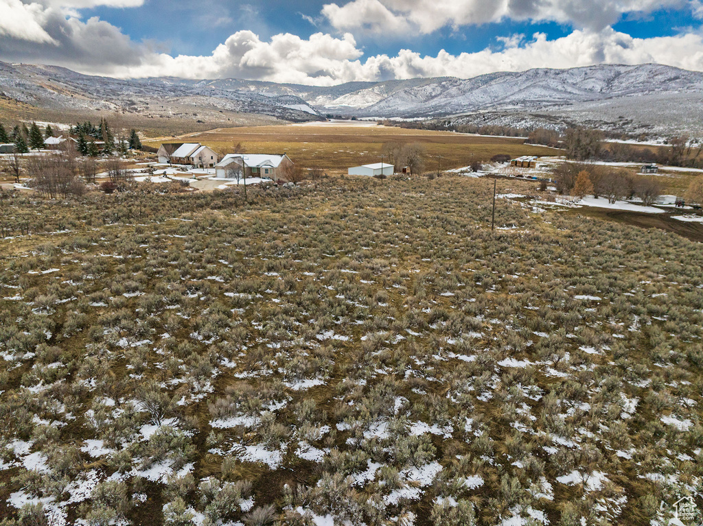 Property view of mountains with a rural view