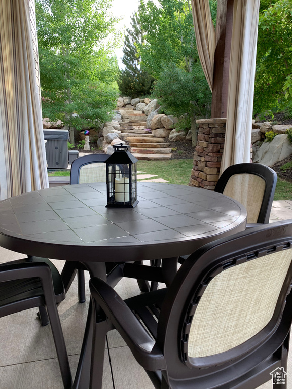 View of patio featuring outdoor dining area