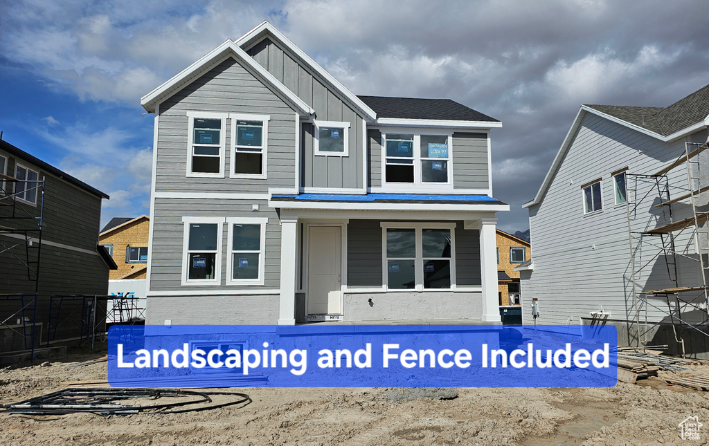 View of front of house featuring board and batten siding