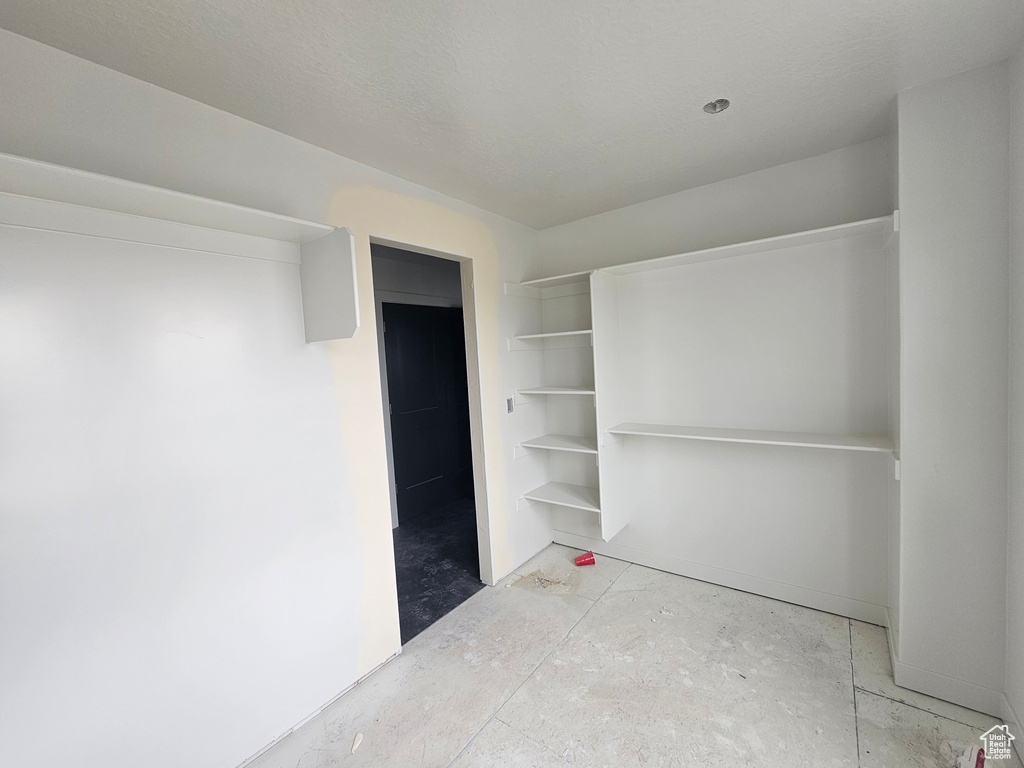 Exterior space with a textured ceiling