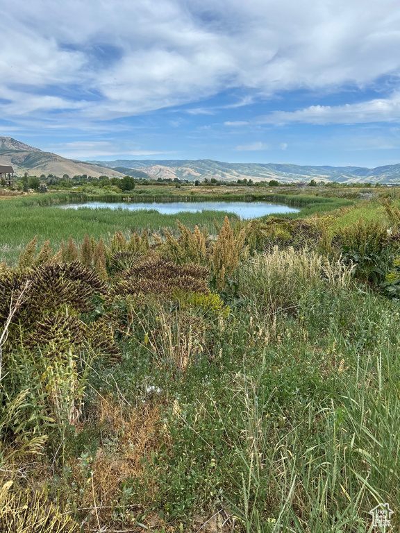 Water view featuring mountains