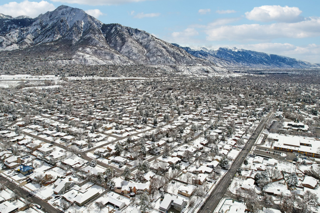 View of mountain background featuring nearby suburban area