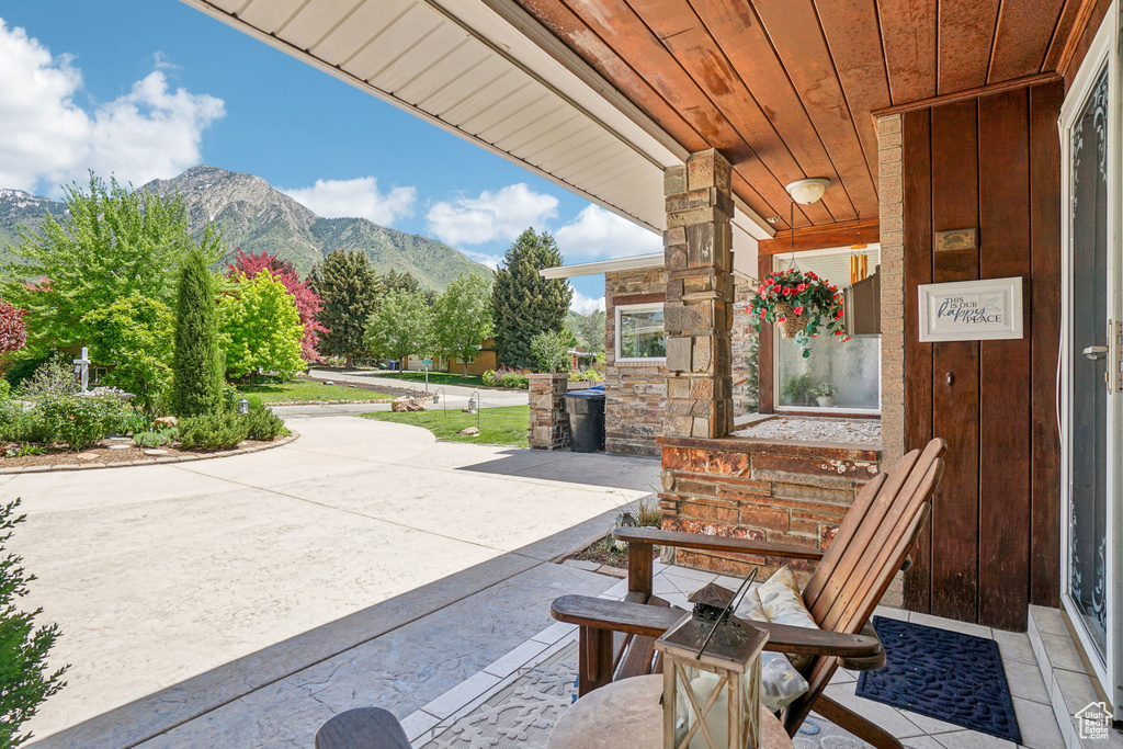 View of patio / terrace featuring a mountain view