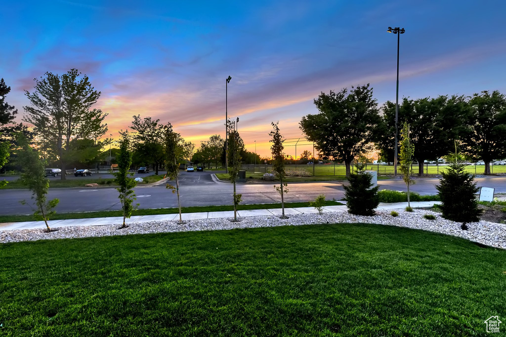 View of home\\\'s community featuring a yard